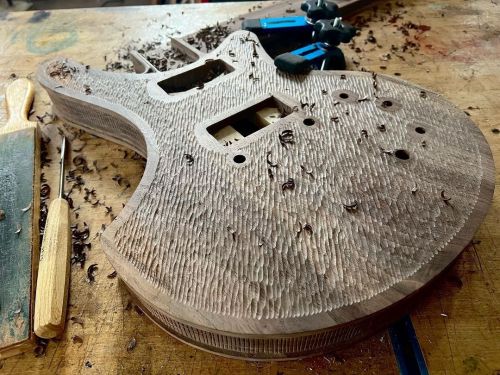 Somewhere between meditative and “what the hell was I thinking?” #handmade #coolguitars #carving #bo