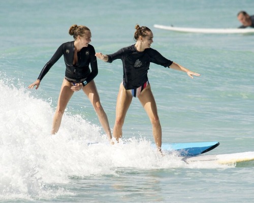 03/01/15 - Cara Delevinge surfing in Barbados with Suki Waterhouse.