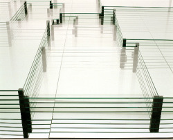  Carsten Nicolai perfect square 2004glass, aluminum, wood, rubber362 x 362 x 21cmwith stage elements400 x 400 x 50cm perfect square consists of an accumulation of glass sheets of various sizes which form a complex visual composition through the concept