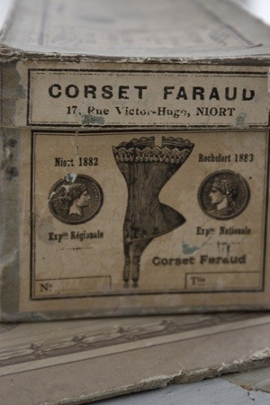 Vintage corset box~use the labels from your antique magazines to recreate one for your corset! 