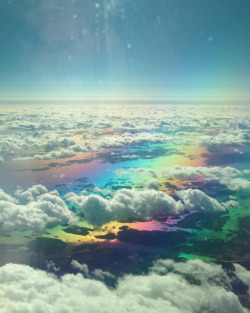 phindsy: painandcats:  [two images taken from above the clouds. A rainbow is visible below the clouds.]  The sky is gay confirmed 