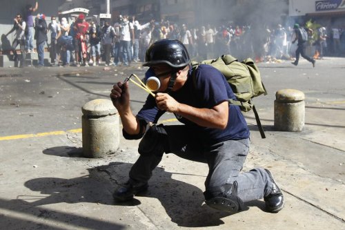 lefilmnoir:  Venezuela’s Riot 12F  PLEASE REBLOG!!! THE MEDIA IN VENEZUELA IS BEING CONTROLLED BY THE GOVERNMENT AND THEY ARE NOT SHOWING THE PEOPLE WHATS HAPPENING, THEY ARE SENDING THE POLICE AND THE ARMY TO SHOOT THE PEOPLE, THE ONLY WAY WE CAN FIND