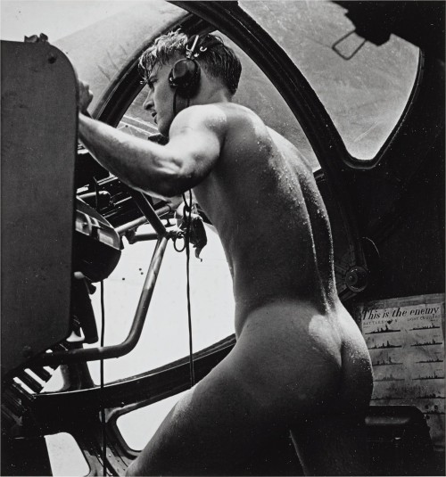 blondebrainpower:  PBY Blister Gunner at Rabaul Harbor, New Guinea (1944)Legend says the PBY was sent to rescue a Marine airman who had been shot down while attacking Japanese forces at Rabaul Harbor. With the airman temporarily blinded and helpless in