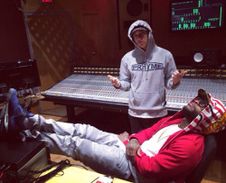 sole-plane:  Em rockin’ the PRhyme hoodie while Royce with the Eminem 4s.  