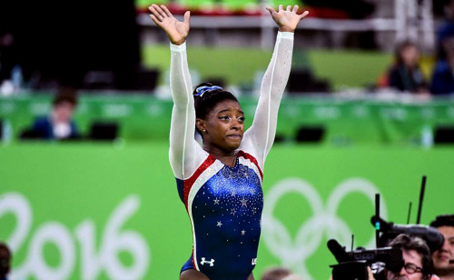 sparklesandchalk:Simone Biles wins the Olympic All-Around with a score of 62.198. She becomes the fi