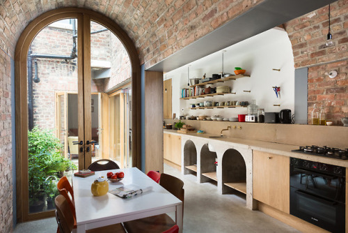 stylish-homes: Two brick barrel vault extension to a Victorian house used as a kitchen surrounding a