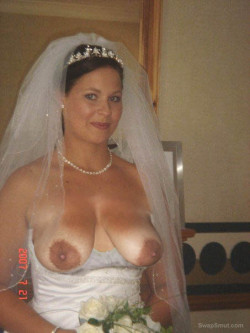 mibigdawg:  Love the dark areolas and the them pressed up against the gown 