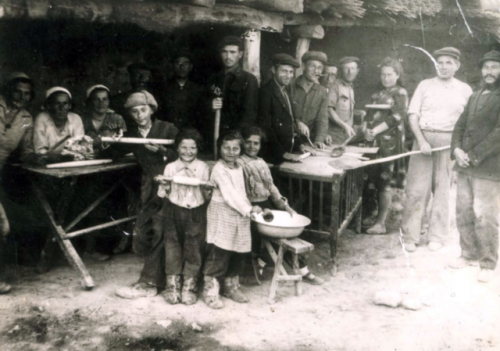 Jews who escaped from Poland to Russia, baking matzah for Passover, USSR, 1943.Yad Vashem Photo Arch