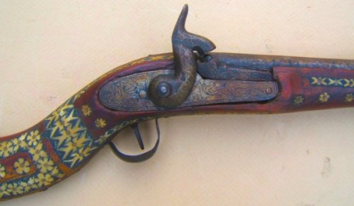 A small, ornate Afghan percussion jezail carbine, 19th century.