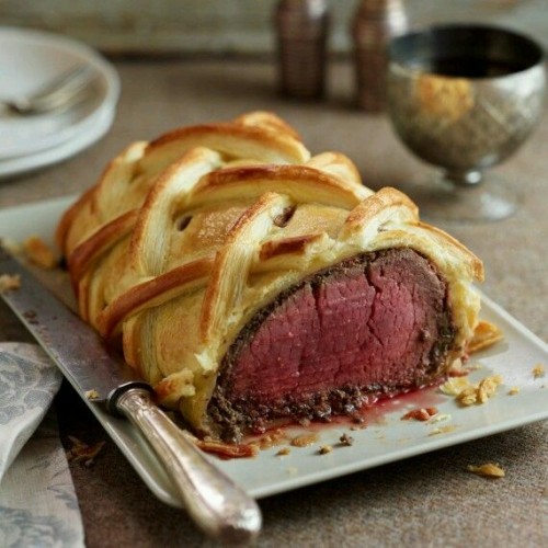 shy-undercoverfreak this is a beautiful beef wellington the meat is flame mignon steak wrapped with puff pastry and mushroom onion any kind of wine as well one day I’m going to make this can’t wait for it. 😍😍😍😍