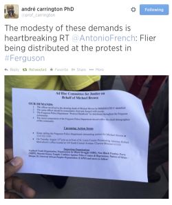 ethiopienne:  Flier being distributed at the protest in Ferguson. Text reads as follows: Ad Hoc Committee for Justice on Behalf of Michael BrownOUR DEMANDS: The officer involved in the shooting death of Michael Brown be IMMEDIATELY identified. The same
