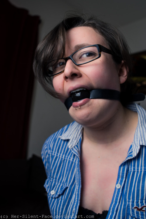  Our latest set… Audrey in something simple and gagged with tape and her favorite ball gag. T