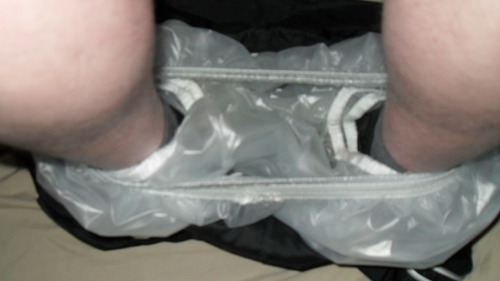 Wet diapers in my plastic pants round my ankles then just plastic pants ready to be pulled up over m