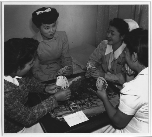 Bridge game, Nurse Hamaguchi and friends, Manzanar Relocation Center, California. Photograph by Ansel Adams, 1943.