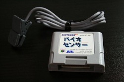 isquirtmilkfrommyeye:  In 1998 Nintendo released Tetris 64 (aka bio Tetris) for the N64 in Japan. The game included the N64 Bio Sensor. The idea was for the player to plug it into the controller and attach a wired clip on the other end to their ear. The