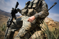 majorleagueinfidel:  A US soldier from the 2/506 Infantry Regiment of the 101st Airborne Division rests during a comat patrol. Image taken January 4, 2009 in Sabari District, Khost Province, Afghanistan.