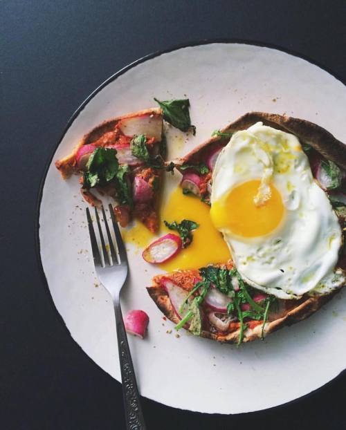 Pita with sliced shallots, radishes, za'atar and a fried egg. Seriously, that yolk tho. (:: @donny_t