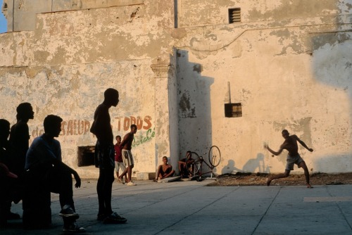 ahmedloso:David Alan HarveyCUBA. Havana. 1998. Teenage boys play a pickup game of baseball without t