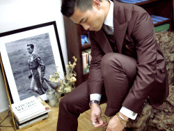 huaizuwang:  Kevin Wang in a maroon HVRMINN suit. 