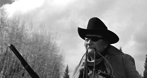 John Wayne Flip Cocking, Or Spin Cocking, His Winchester In Stagecoach (above, 1939) And True Grit (below,