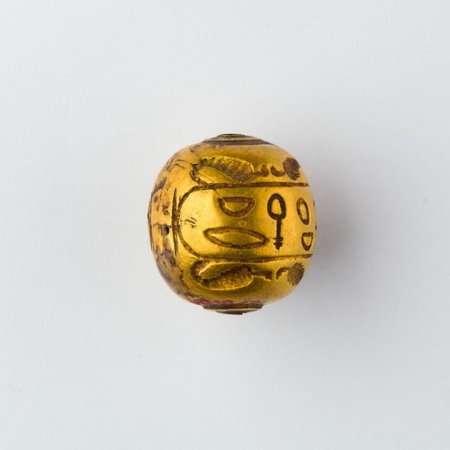 lionofchaeronea:Ancient Egyptian hollow gold bead bearing the names of the 19th Dynasty pharaoh Rame