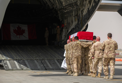 fuckyeahcanadianforces - Members of Operation IMPACT carry the...