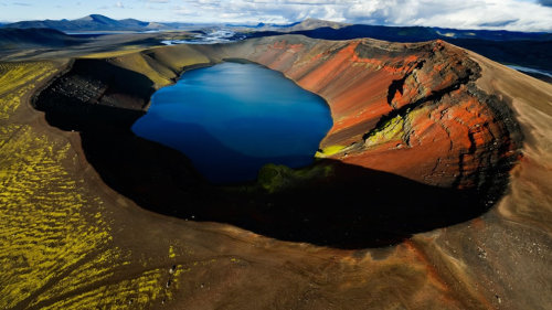 sosuperawesome:  The World’s Most Beautiful Crater Lakes  If you approached the rim of a volcano and looked down into it, you might expect to see a lava pool, but if the volcano previously erupted and then the top of it collapsed into a huge bowl-shaped