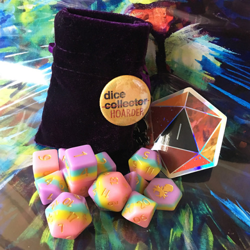 schlady-dice:Unicorn poop dice, dice hoarding pin, and a crit fail sticker… we’re going down in styl