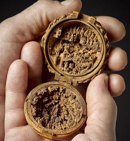 legendary-scholar:  Here is a wooden prayer nut representing the Last Judgment.Miniature wooden sculptures were carried out over a very short period of time between 1500 and 1530 in Flanders and or the Netherlands.