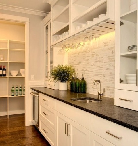 Kitchen Pantry In SeattleExample Of An Arts And Crafts Medium Tone Wood Floor Kitchen Pantry Design With