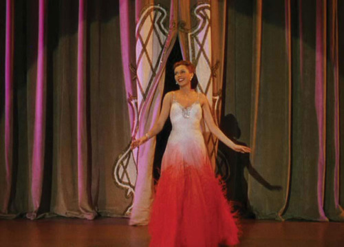 costumeloverz71: Nadine Hale’s (Ann Miller) red/white feathered gown. Easter Parade (1948). Co