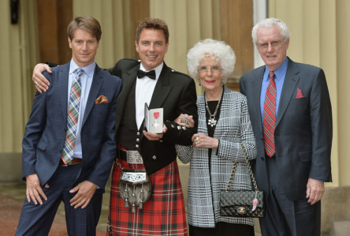 nixxie-fic:More New Pictures of John Barrowman getting his MBE from Princess Anne at Buckingham Pala