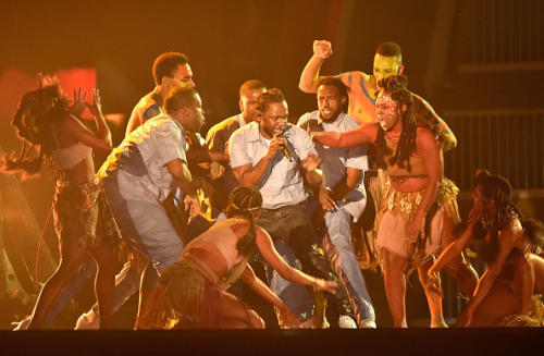 applemusic:  Kendrick Lamar preforms at The GRAMMYs Powerful. Taking his message to the world. Kendrick Lamar shutting down the GRAMMYs stage.  