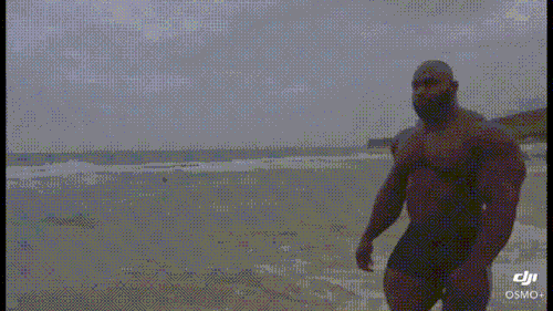 blackonyxstone:Akim walking on the beach