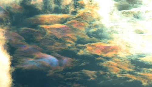 nubbsgalore:  photos of cloud iridescence — caused as light diffracts through tiny ice crystals or water droplets of uniform size, usually in lenticular clouds — by rolf kohl. see also: circumhorizontal arcs, asperatus clouds, mammatus clouds, polar