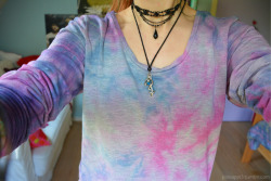 pineappl3:  a tie-dye shirt that I made :D the colors are not as bright as most tie-dye stuff because this shirt was grey and I think that’s pretty cool instagram: iskie.is.cool 