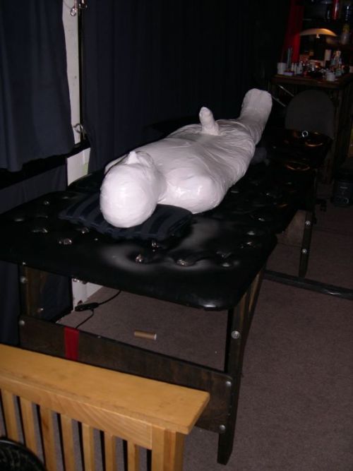 chillgguy:  Great mummification scene - white tape over vet wrap - and a plug gag in my mouth. Was immobilized overnight - very, very hot! 