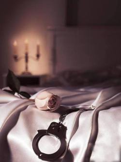 hersubmissiveside:A Rose, Handcuffs and Candles