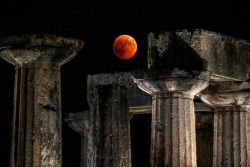 bironism: the blood moon over the temple of Apollo | Corinth, Greece    