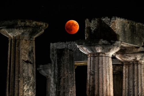 bironism:the blood moon over the temple of Apollo | Corinth, Greece