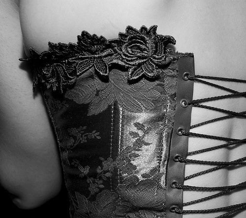 I have a black brocade corset kind of like this one. I love to wear it out as a top of dressy kinds 