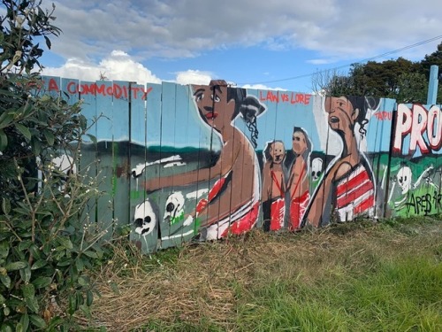 &ldquo;Protect Ihumātao&rdquo; mural in Aotearoa (New Zealand). Ihumātao is an area of farmland on 