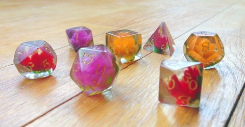 peppapigvevo: battlecrazed-axe-mage: I had to grab this gorgeous custom dice set off Etsy, each one 