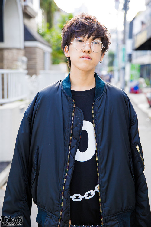 17-year-old Yuto on the street in Harajuku wearing a draped bomber jacket from Elcasion with a Long 