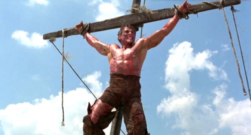 ropermike:Jean-Claude Van Damme in Cyborg (1989). More pics here.A mercenary is crucified on the mas