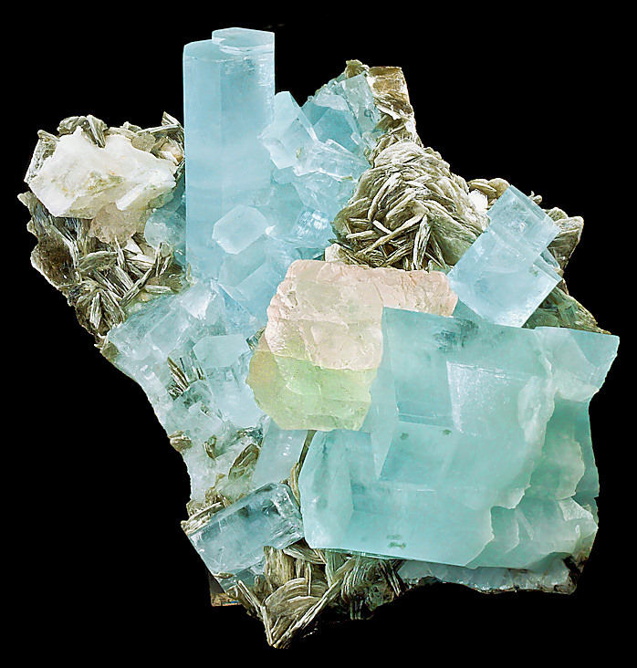 fuckyeahmineralogy:  Aquamarine with fluorite and muscovite; Gilgit District, Pakistan