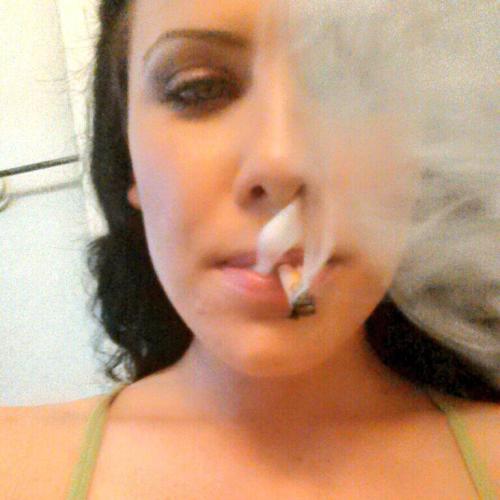 pornstars-getting-high:  It’s Katie St. Ives again smoking on her previously rolled blunt.