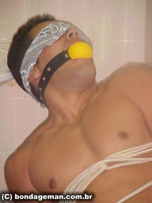 Anderson kidnapped, ballgagged and blindfolded
