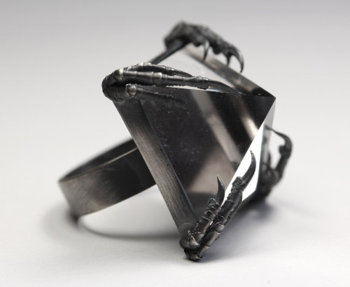 bloodmilk:  mini crystal tomb ring with sterling bezel and cast sparrow claws. bloodmilk 