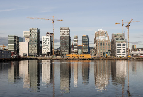 archatlas:    DNB West Building Dark Arkitekter   Barcode is part of the mixed-use development of Bjørvika, a former harbor area and highway intersection that expands Oslo city center. Dark teamed with MVRDV and A-Lab and won the international design